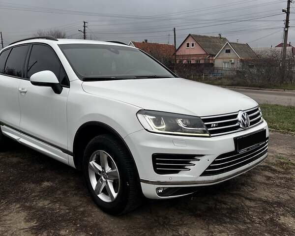 Білий Фольксваген Туарег, об'ємом двигуна 2.97 л та пробігом 334 тис. км за 26000 $, фото 1 на Automoto.ua