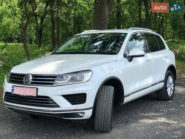 Білий Фольксваген Туарег, об'ємом двигуна 3 л та пробігом 222 тис. км за 24999 $, фото 49 на Automoto.ua