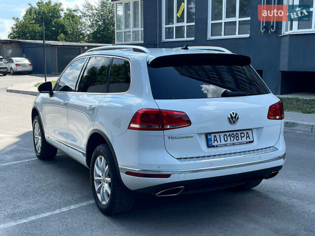 Белый Фольксваген Туарег, объемом двигателя 2.97 л и пробегом 237 тыс. км за 28500 $, фото 1 на Automoto.ua
