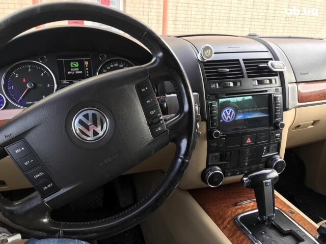 Чорний Фольксваген Туарег, об'ємом двигуна 2.5 л та пробігом 300 тис. км за 10500 $, фото 1 на Automoto.ua