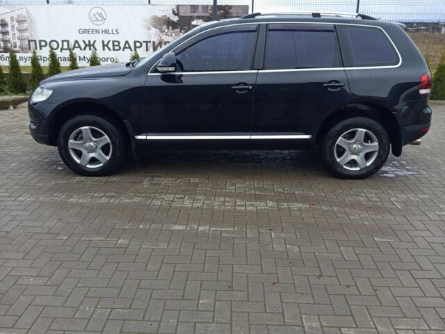 Черный Фольксваген Туарег, объемом двигателя 3 л и пробегом 237 тыс. км за 14300 $, фото 4 на Automoto.ua