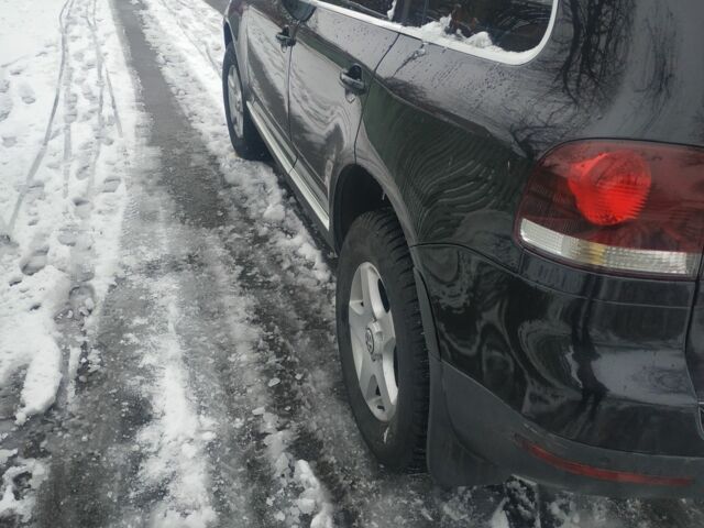 Черный Фольксваген Туарег, объемом двигателя 3 л и пробегом 262 тыс. км за 11200 $, фото 2 на Automoto.ua