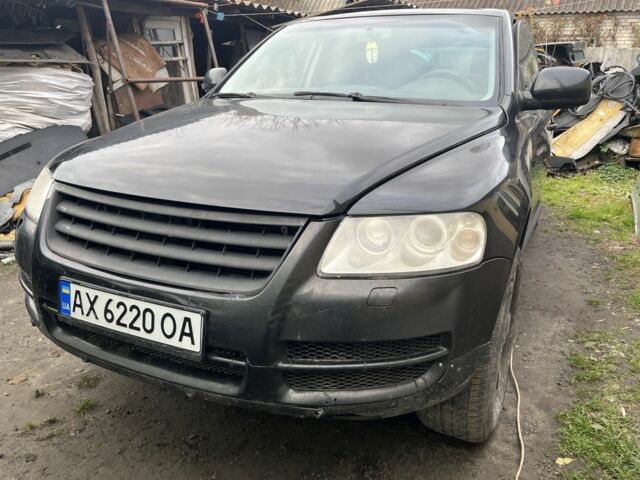 Черный Фольксваген Туарег, объемом двигателя 3 л и пробегом 370 тыс. км за 3550 $, фото 1 на Automoto.ua