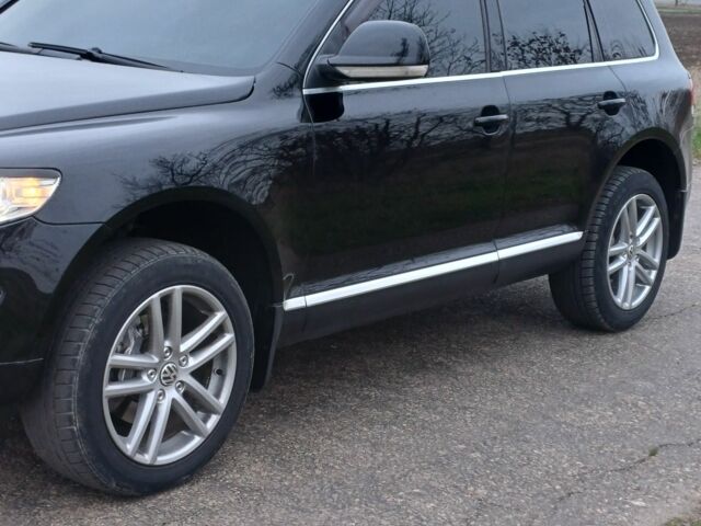 Черный Фольксваген Туарег, объемом двигателя 3 л и пробегом 146 тыс. км за 13000 $, фото 1 на Automoto.ua