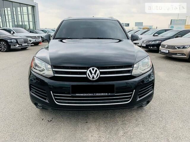 Черный Фольксваген Туарег, объемом двигателя 3 л и пробегом 264 тыс. км за 18500 $, фото 1 на Automoto.ua