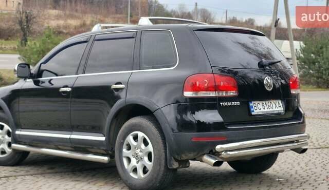 Черный Фольксваген Туарег, объемом двигателя 3.2 л и пробегом 237 тыс. км за 7500 $, фото 2 на Automoto.ua