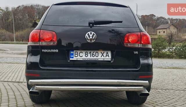 Черный Фольксваген Туарег, объемом двигателя 3.2 л и пробегом 237 тыс. км за 7500 $, фото 9 на Automoto.ua