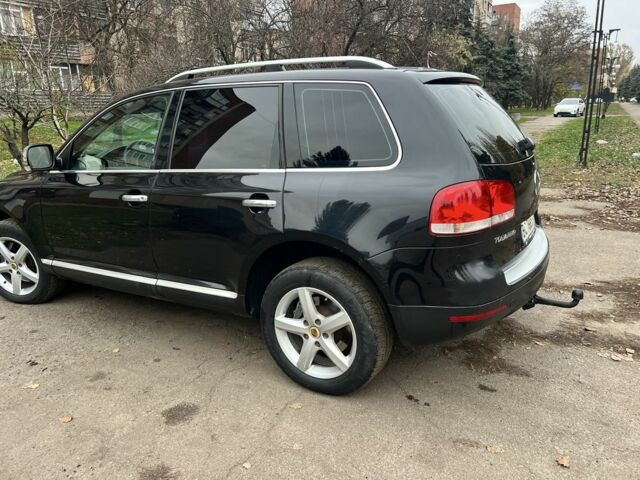 Черный Фольксваген Туарег, объемом двигателя 3.2 л и пробегом 340 тыс. км за 7000 $, фото 2 на Automoto.ua