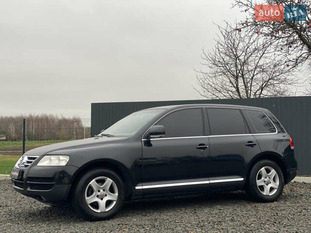 Черный Фольксваген Туарег, объемом двигателя 2.5 л и пробегом 373 тыс. км за 6950 $, фото 79 на Automoto.ua