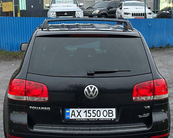 Черный Фольксваген Туарег, объемом двигателя 4.17 л и пробегом 343 тыс. км за 5500 $, фото 3 на Automoto.ua