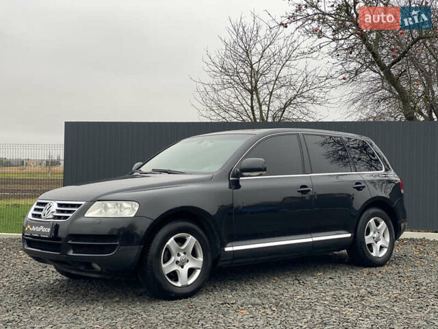 Черный Фольксваген Туарег, объемом двигателя 2.5 л и пробегом 373 тыс. км за 6950 $, фото 78 на Automoto.ua