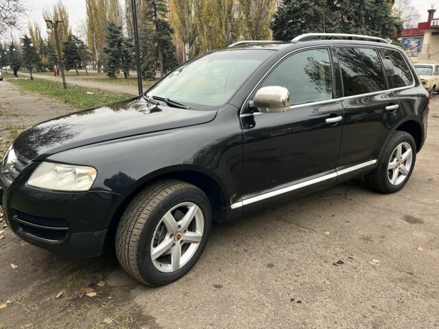 Черный Фольксваген Туарег, объемом двигателя 3.2 л и пробегом 340 тыс. км за 7000 $, фото 1 на Automoto.ua