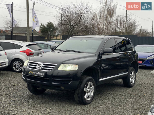 Черный Фольксваген Туарег, объемом двигателя 2.5 л и пробегом 373 тыс. км за 6950 $, фото 76 на Automoto.ua