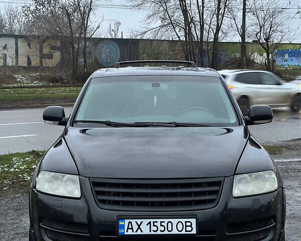 Черный Фольксваген Туарег, объемом двигателя 4.17 л и пробегом 343 тыс. км за 5500 $, фото 1 на Automoto.ua