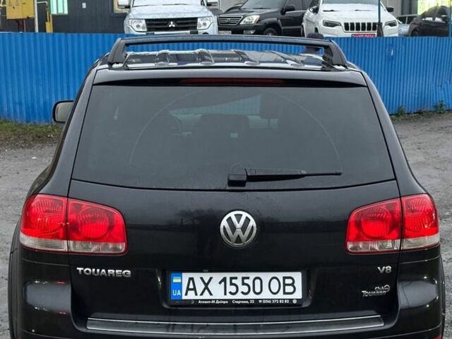 Чорний Фольксваген Туарег, об'ємом двигуна 4.2 л та пробігом 343 тис. км за 5500 $, фото 4 на Automoto.ua