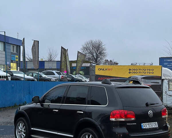 Черный Фольксваген Туарег, объемом двигателя 4.17 л и пробегом 343 тыс. км за 5500 $, фото 5 на Automoto.ua