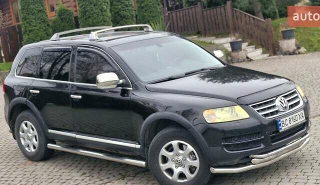 Черный Фольксваген Туарег, объемом двигателя 3.2 л и пробегом 237 тыс. км за 7500 $, фото 4 на Automoto.ua