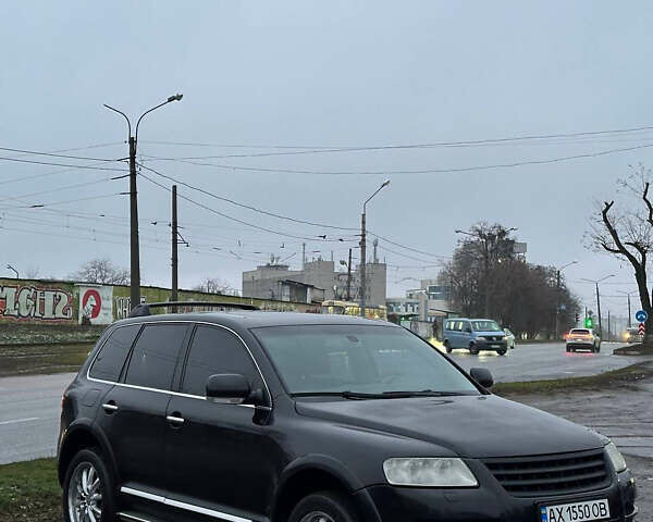 Черный Фольксваген Туарег, объемом двигателя 4.17 л и пробегом 343 тыс. км за 5500 $, фото 2 на Automoto.ua