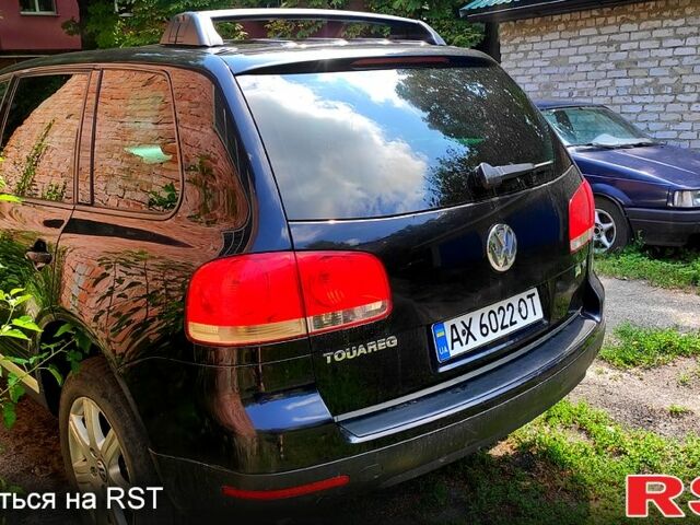 Черный Фольксваген Туарег, объемом двигателя 3.2 л и пробегом 430 тыс. км за 9500 $, фото 2 на Automoto.ua