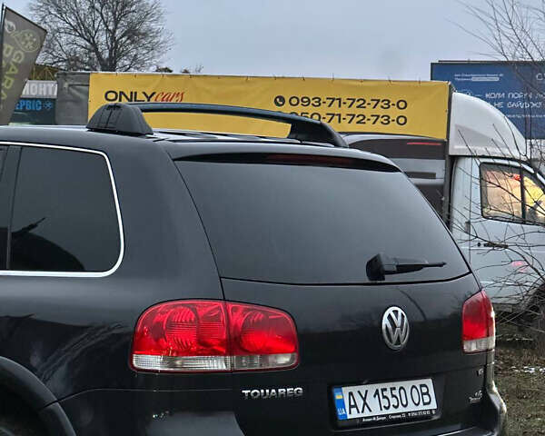 Черный Фольксваген Туарег, объемом двигателя 4.17 л и пробегом 343 тыс. км за 5500 $, фото 6 на Automoto.ua