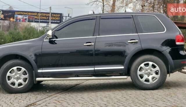 Черный Фольксваген Туарег, объемом двигателя 3.2 л и пробегом 237 тыс. км за 7500 $, фото 6 на Automoto.ua