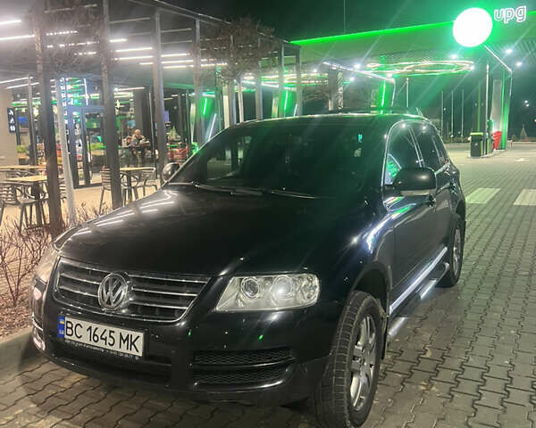 Чорний Фольксваген Туарег, об'ємом двигуна 3.2 л та пробігом 300 тис. км за 7600 $, фото 4 на Automoto.ua
