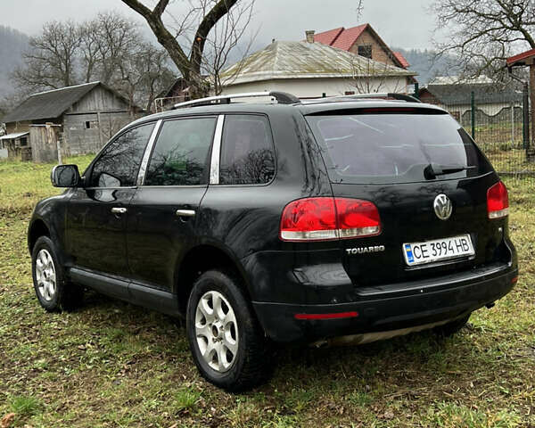 Чорний Фольксваген Туарег, об'ємом двигуна 3.19 л та пробігом 260 тис. км за 5300 $, фото 4 на Automoto.ua