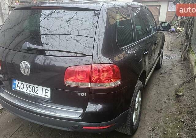 Чорний Фольксваген Туарег, об'ємом двигуна 2.46 л та пробігом 390 тис. км за 8500 $, фото 4 на Automoto.ua