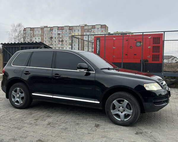 Черный Фольксваген Туарег, объемом двигателя 2.46 л и пробегом 426 тыс. км за 7400 $, фото 3 на Automoto.ua