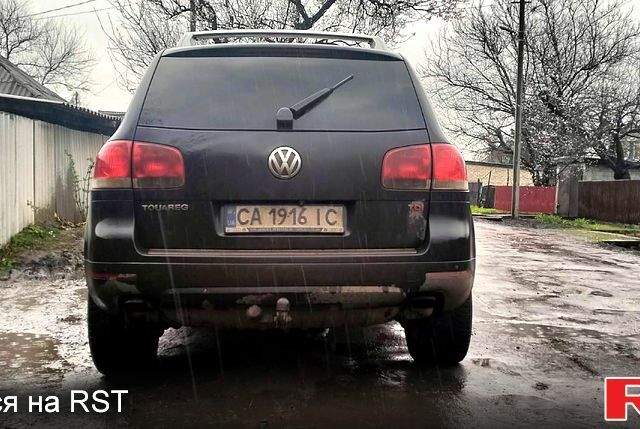 Чорний Фольксваген Туарег, об'ємом двигуна 4.9 л та пробігом 278 тис. км за 7740 $, фото 3 на Automoto.ua