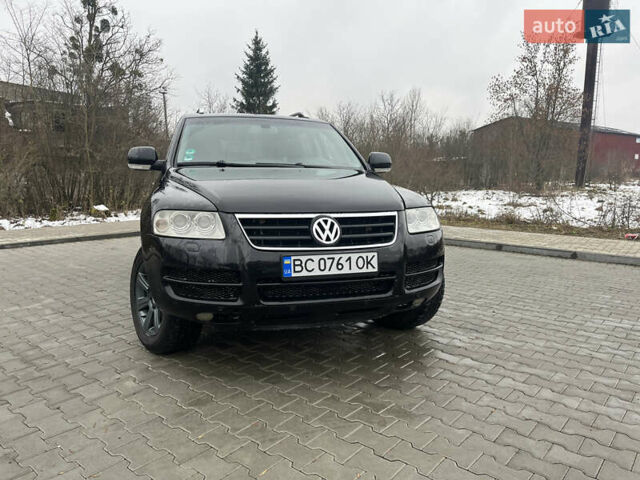 Черный Фольксваген Туарег, объемом двигателя 2.46 л и пробегом 221 тыс. км за 6700 $, фото 1 на Automoto.ua