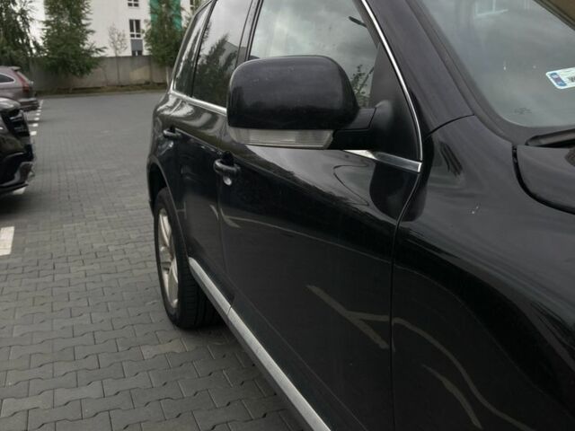 Черный Фольксваген Туарег, объемом двигателя 5 л и пробегом 225 тыс. км за 4099 $, фото 4 на Automoto.ua