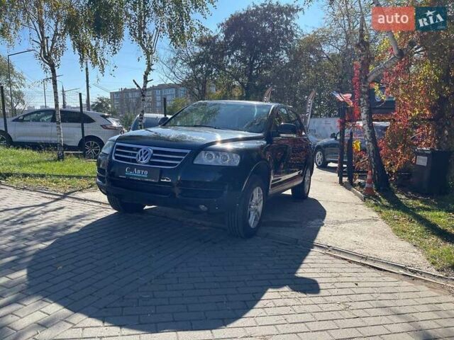 Черный Фольксваген Туарег, объемом двигателя 3.19 л и пробегом 381 тыс. км за 6700 $, фото 2 на Automoto.ua
