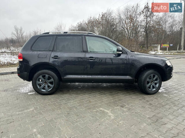 Черный Фольксваген Туарег, объемом двигателя 2.46 л и пробегом 221 тыс. км за 6700 $, фото 9 на Automoto.ua