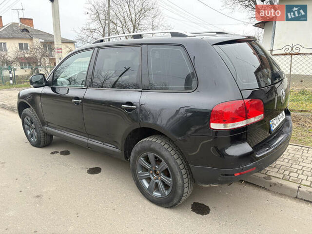 Черный Фольксваген Туарег, объемом двигателя 2.51 л и пробегом 321 тыс. км за 5999 $, фото 3 на Automoto.ua