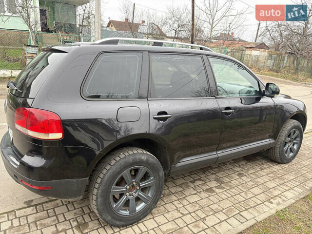 Черный Фольксваген Туарег, объемом двигателя 2.51 л и пробегом 321 тыс. км за 5999 $, фото 6 на Automoto.ua