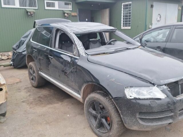 Черный Фольксваген Туарег, объемом двигателя 2.5 л и пробегом 250 тыс. км за 2000 $, фото 1 на Automoto.ua