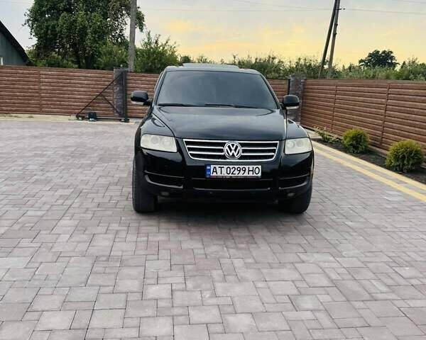 Черный Фольксваген Туарег, объемом двигателя 2.46 л и пробегом 330 тыс. км за 7900 $, фото 2 на Automoto.ua