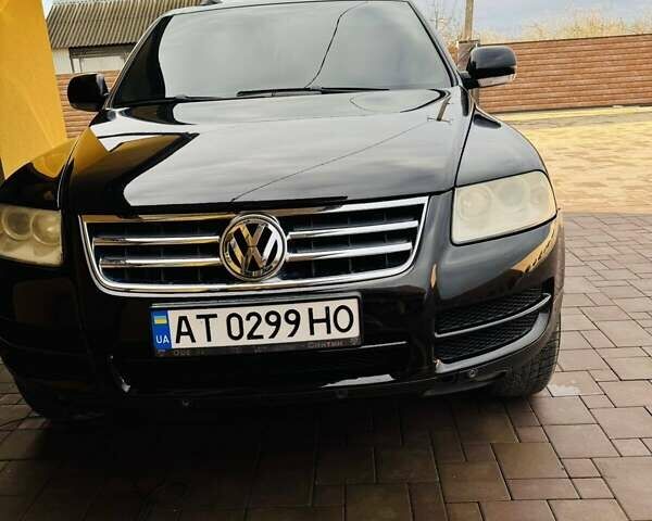 Чорний Фольксваген Туарег, об'ємом двигуна 2.46 л та пробігом 330 тис. км за 7300 $, фото 1 на Automoto.ua