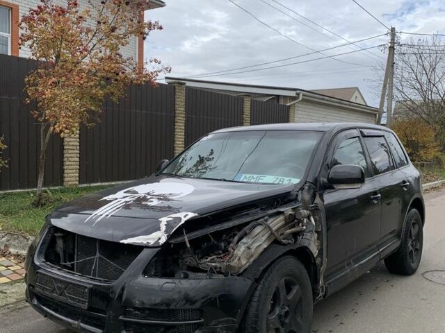 Черный Фольксваген Туарег, объемом двигателя 2.5 л и пробегом 399 тыс. км за 2400 $, фото 1 на Automoto.ua