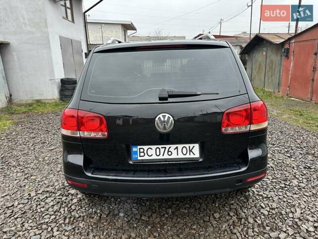 Черный Фольксваген Туарег, объемом двигателя 2.46 л и пробегом 225 тыс. км за 6450 $, фото 8 на Automoto.ua