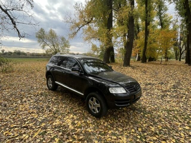 Черный Фольксваген Туарег, объемом двигателя 2.5 л и пробегом 300 тыс. км за 4100 $, фото 1 на Automoto.ua