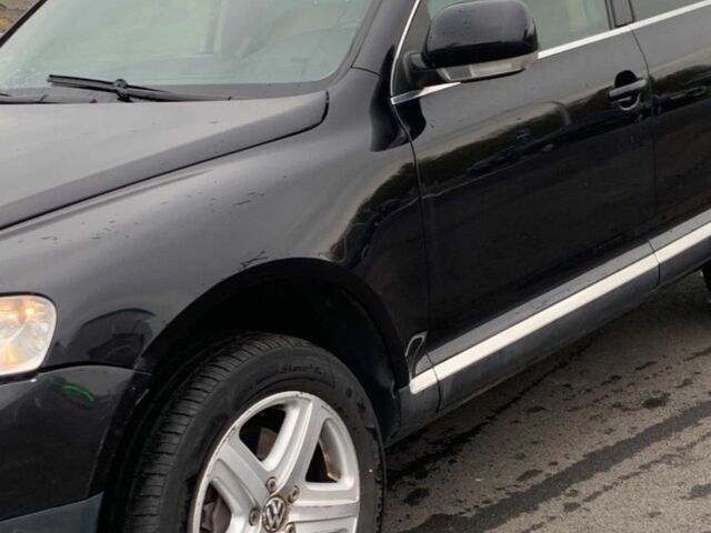 Черный Фольксваген Туарег, объемом двигателя 5 л и пробегом 230 тыс. км за 5800 $, фото 9 на Automoto.ua