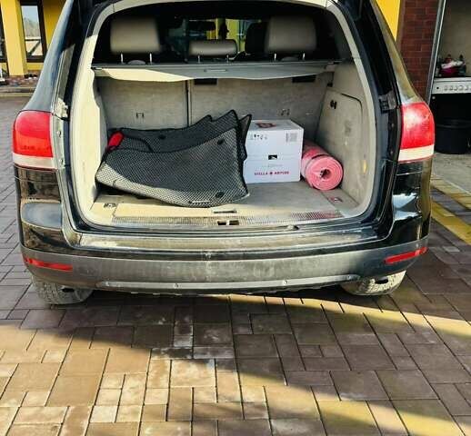 Чорний Фольксваген Туарег, об'ємом двигуна 2.46 л та пробігом 330 тис. км за 7300 $, фото 6 на Automoto.ua