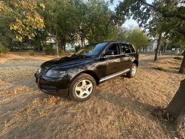 Черный Фольксваген Туарег, объемом двигателя 2.5 л и пробегом 319 тыс. км за 5500 $, фото 2 на Automoto.ua