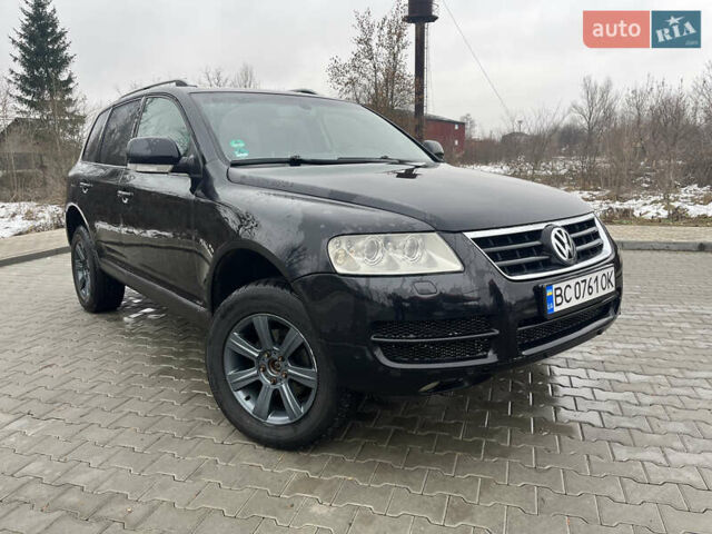 Черный Фольксваген Туарег, объемом двигателя 2.46 л и пробегом 221 тыс. км за 6700 $, фото 6 на Automoto.ua
