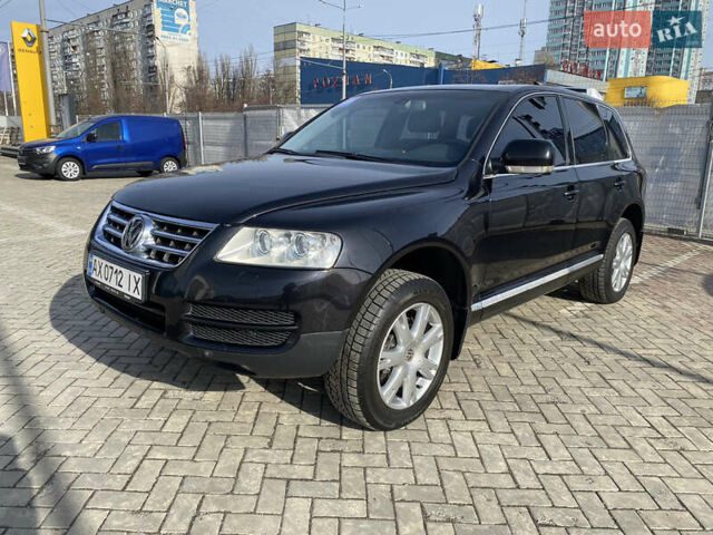 Чорний Фольксваген Туарег, об'ємом двигуна 3.2 л та пробігом 256 тис. км за 9200 $, фото 1 на Automoto.ua