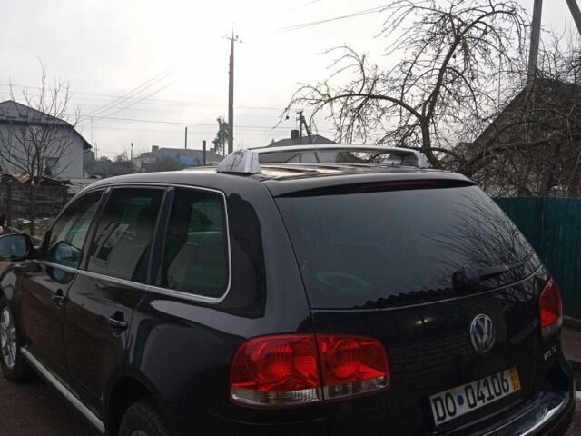 Черный Фольксваген Туарег, объемом двигателя 5 л и пробегом 290 тыс. км за 5000 $, фото 4 на Automoto.ua