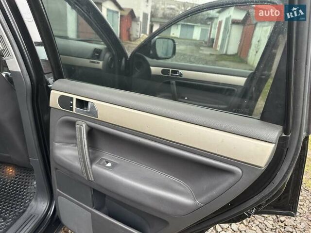 Черный Фольксваген Туарег, объемом двигателя 2.46 л и пробегом 225 тыс. км за 6450 $, фото 29 на Automoto.ua