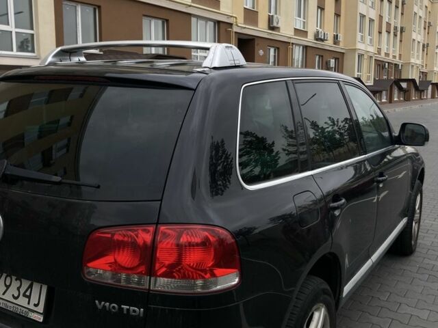 Черный Фольксваген Туарег, объемом двигателя 5 л и пробегом 225 тыс. км за 4099 $, фото 6 на Automoto.ua